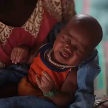 African baby with healthcare wearables devices