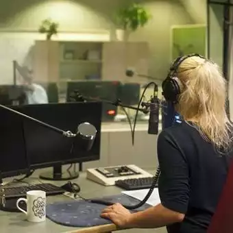 woman presenter in a radio station