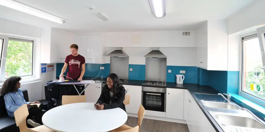 Students in the kitchen of their accommodation at Brunel University London.